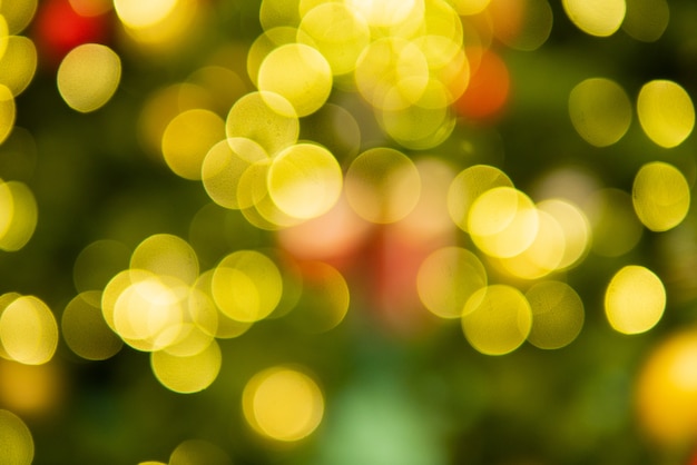 Green and yellow Christmas bokeh decoration for celebrating seasonal greeting festival