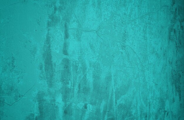 Grunge blue cracked cement wall texture background Old Cracked Blue Wall Background