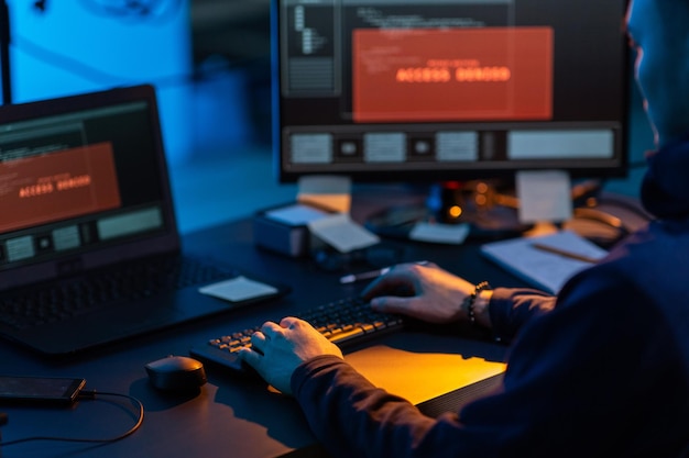 hacker using computer virus for cyber attack