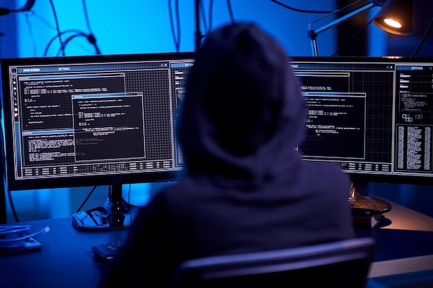 hacker using computer virus for cyber attack