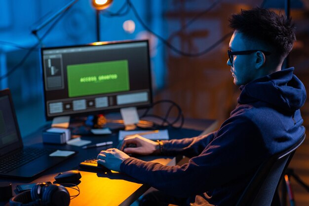 hacker using computer virus for cyber attack