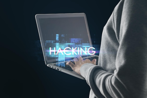 Hacker using laptop with abstract glowing big data glitch on black background Hacking and theft concept Unique Design Abstract Digital Pixel Noise Glitch Error Video Damage
