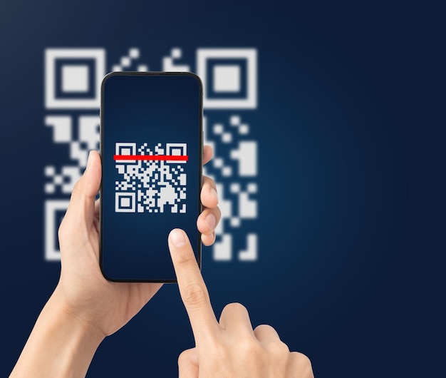 Hand using mobile smart phone scan Qr code Barcode reader Qr code payment Cashless technology Digital money concept