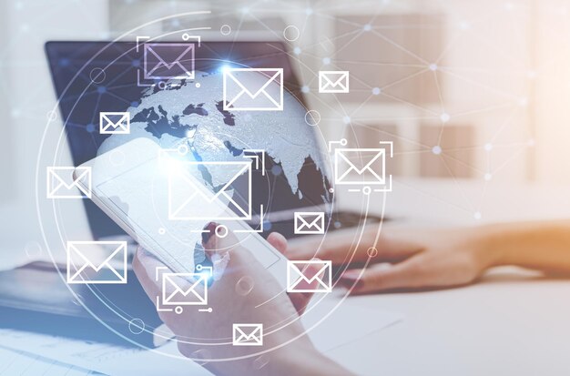 hands of a woman using smartphone. email holorams business communication and decision making concept. toned image double exposure mock up elements of this image furnished by nasa