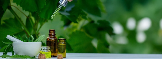 hemp or cannabis essential oil on a light background