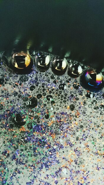 High angle view of bubbles in bucket