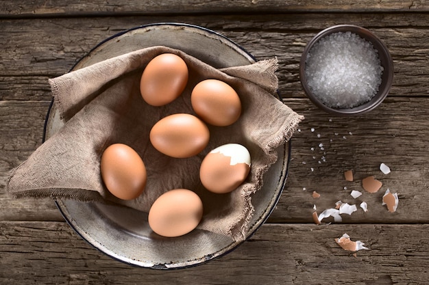 High angle view of eggs in container on table