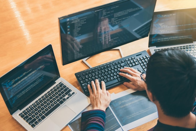 High angle view of man using computer on table