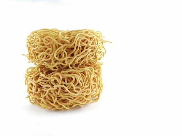 High angle view of noodles against white background