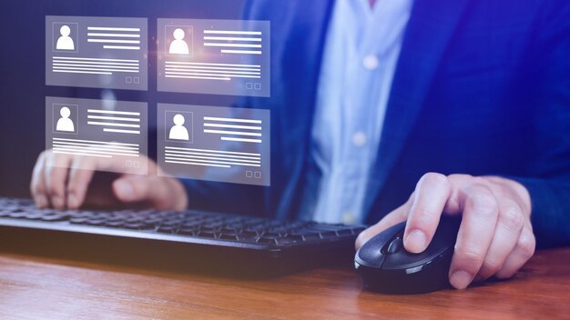 Human resources manager choosing professional profile to hire on virtual screen interface recruitment concept Businessman hand pointing icon resource HR management concept