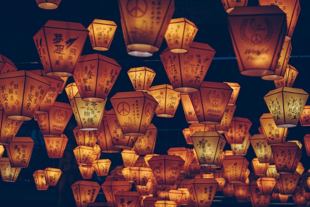 Illuminated lanterns hanging at night