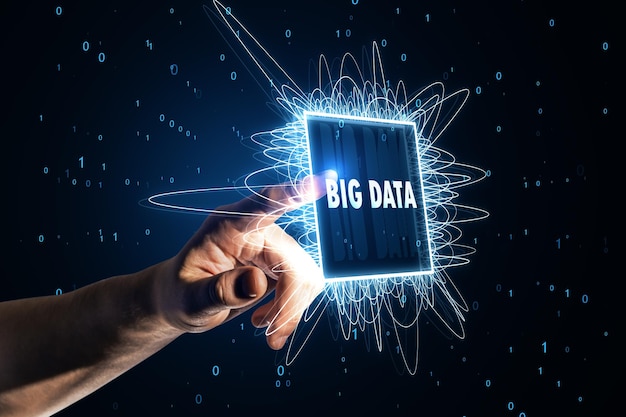 Interactive concept of a hand touching a holographic big data interface with binary code Technology and analytics concept
