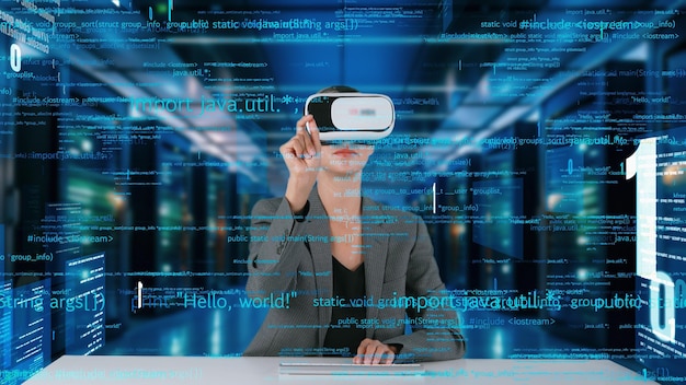 IT developer typing computer code for analyzing intelligent by VR Contraption