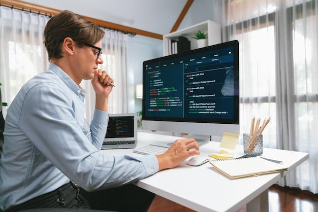 IT looking at online software development on pc align working laptop Pecuniary