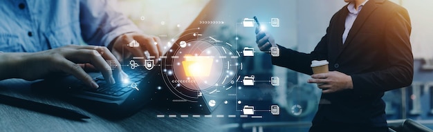 IT staff working with Document Management System DMS online documentation database and process automation to efficiently manage files Corporate business technology