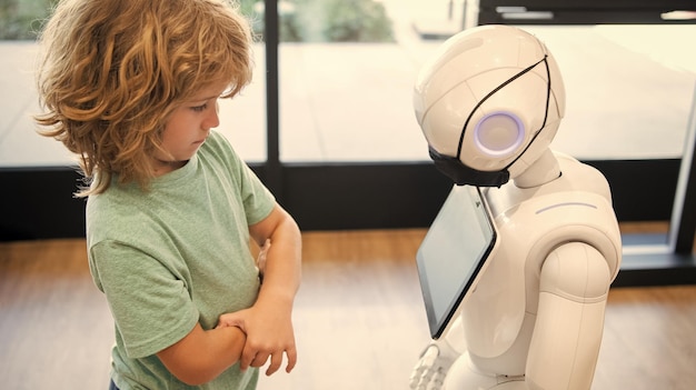 kid interact with robot artificial intelligence tech progress