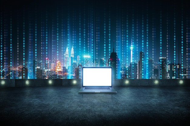Laptop at roof top with abstract software developer programming binary computer code virtual city skyline