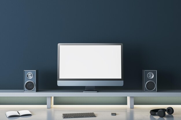 luxury dark blue designer workplace with empty mock up computer screen loud speakers and other items 3d rendering