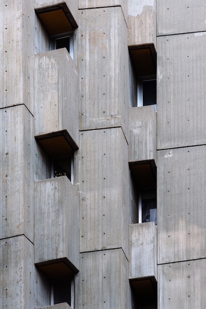 Luxury residential  building in central Madrid. Rent, market and real estate investment. Concrete brutalism facade