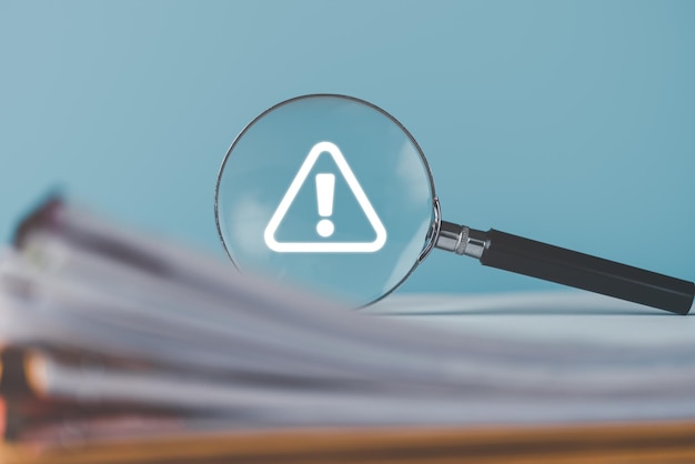 magnifying glass placed on document check box list iconVerification of procedures through documents