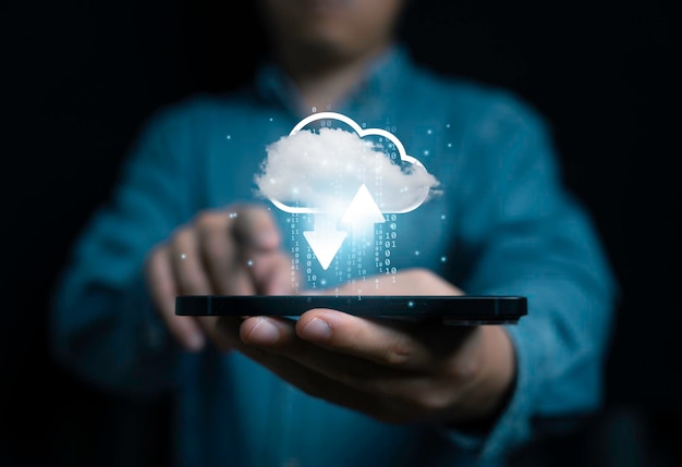 Man holding smartphone with virtual cloud computing on for Cloud computing is system for sharing download and upload big data information