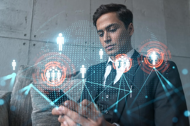 Man in office working with Smartphone Searching for new people connections Social media hologram typing phone Double exposure