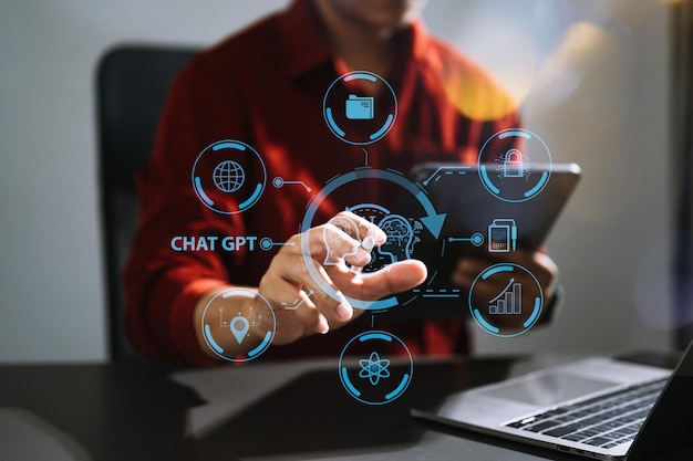Man using chatbot in computer and tablet smart intelligence AiChat GPT Chat with AI Artificial Intelligence developed by OpenAI generate Futuristic technology robot in online systemxA