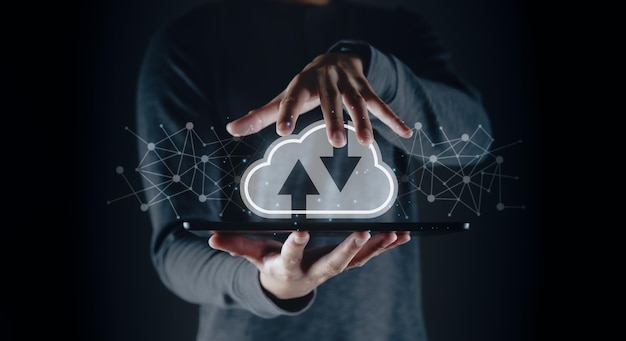 Man using digital tablet with virtual cloud computing with connection line Cloud computing system