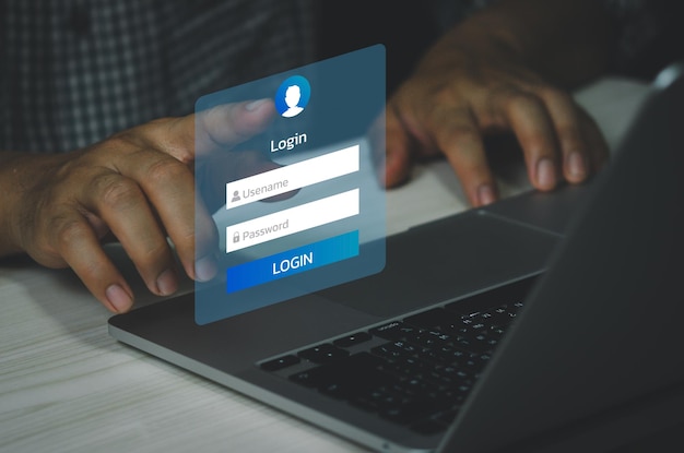 Man using keyboard computer laptop login interface on touch screen user name and password inputs on virtual digital account online concept technology