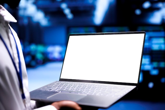 manager inspecting server rackmounts doing intense computations supervisor using mock up tablet to assess strain on cloud computing business caused by ai applications driving up power usage