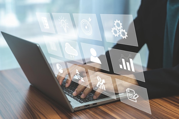 Manager use computer data on dashboard management icon information device connection with AI support at work