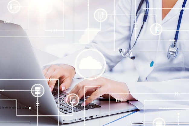 Medic woman working on laptop