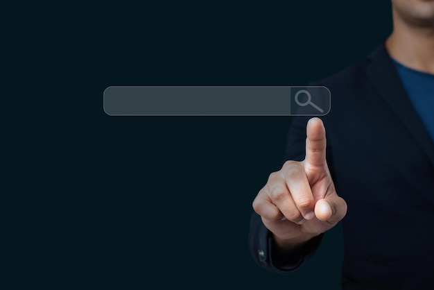 Midsection of person using smart phone against black background