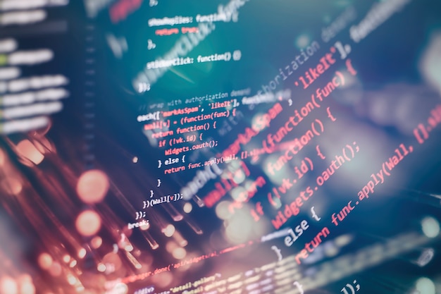 Monitor closeup of function source code.Writing programming functions on laptop. Big data and Internet of things trend.