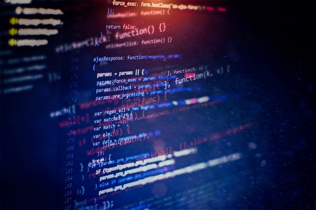 Monitorin lähikuva funktion lähdekoodista. Ohjelmointifunktioiden kirjoittaminen kannettavalla tietokoneella. Big data ja esineiden internet -trendi.