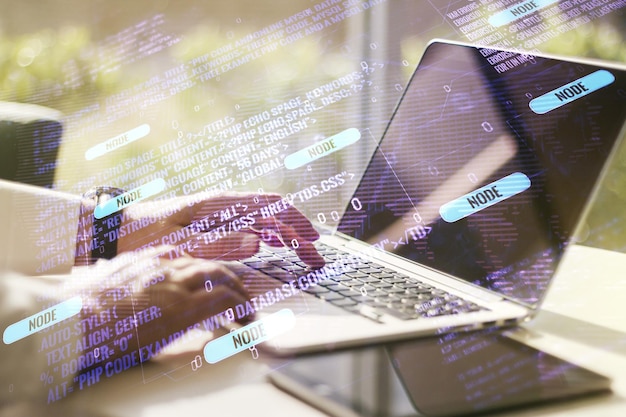 Multi exposure of abstract programming language hologram with world map and hands typing on computer keyboard on background artificial intelligence and neural networks concept