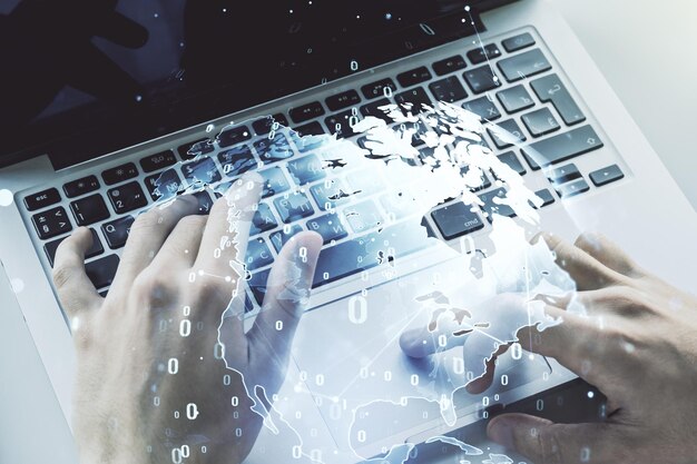 Multi exposure of abstract software development hologram with world map and hands typing on computer keyboard on background global research and analytics concept