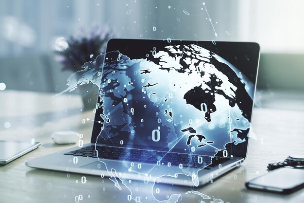 Multi exposure of abstract software development hologram with world map on laptop background global research and analytics concept