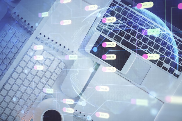 multi exposure of data theme drawing hologram over topview work desk background with computer concept of technology
