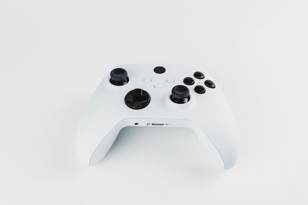 Next generation white game controller isolated on white background.