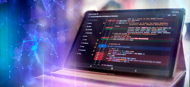 Notebook closeup photo CSS JavaScript and HTML usage Monitor closeup of function source code Abstract IT technology background
