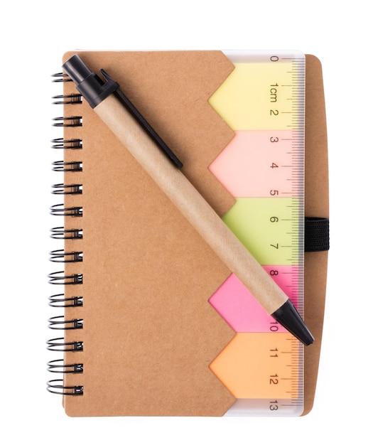 notebooks with a pen isolated on white background