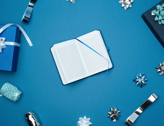 Open notebook with empty white sheets