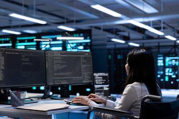 Person with paraplegia working in inclusive server farm facility