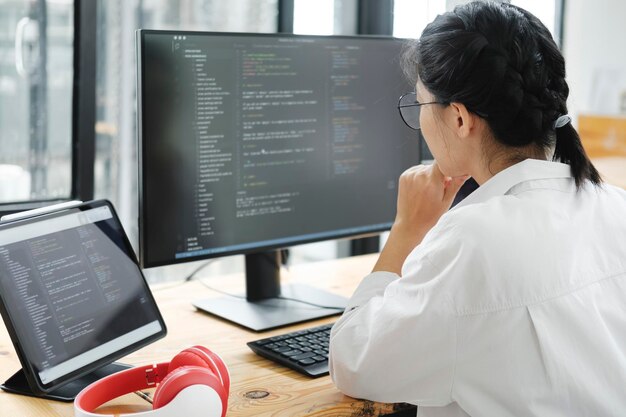 programmer coding and developing software or application project