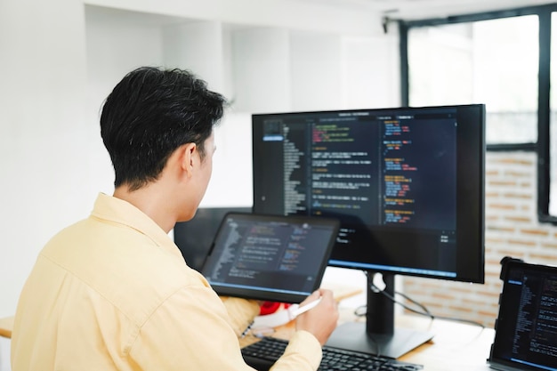 programmer coding and developing software or application project