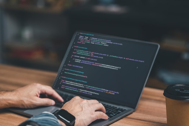 programmer coding compiler encode debug and developer application software for business corporate with laptop computer Man programming coding web app from work at home code show screen monitor