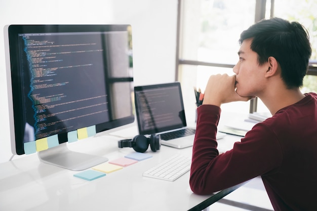 Programmers and developer teams are coding and developing software