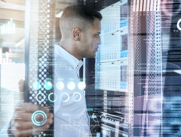 Programming database and digital with a man coder working in a server room for it support or mainframe maintenance Cyber security engineering and code with a programmer at work in a data center