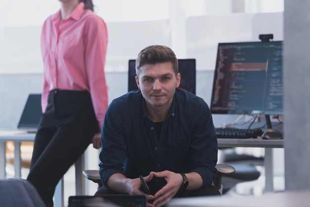 Programming. Man Working On Computer In IT Office, Sitting At Desk Writing Codes. Programmer Typing Data Code, Working On Project In Software Development Company.